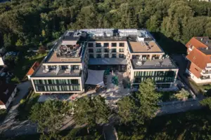 A building surrounded by trees.