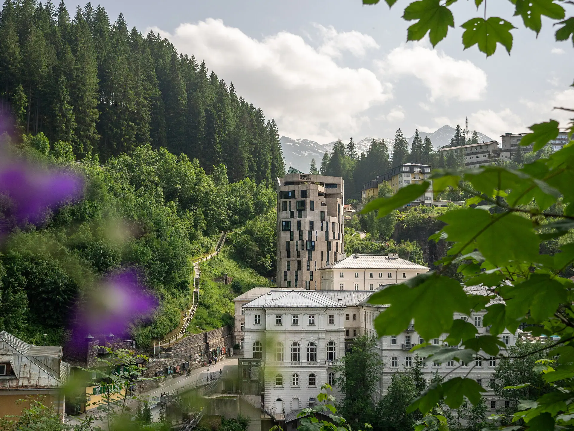 Urban Nature Bad Gastein A tall building with lots of windows