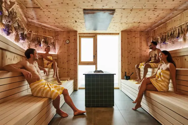 A group of people in a sauna.