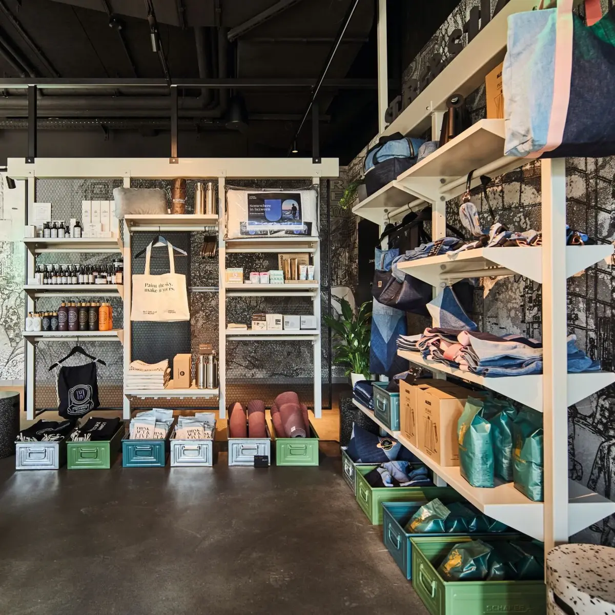 Späti Store & Fabric, St Peter-Ording A shop with shelves and bags.